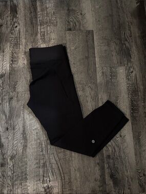 Lululemon WunderTrain 25 Inch Leggings with Pockets - Black - Size 10